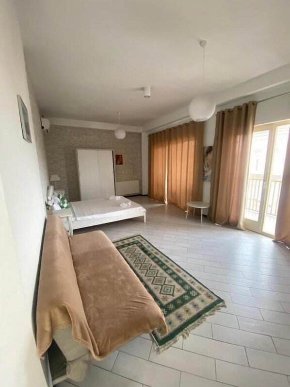 Desk, blackout curtains, soundproofing, iron/ironing board