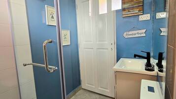 Shower, free toiletries, hair dryer, towels