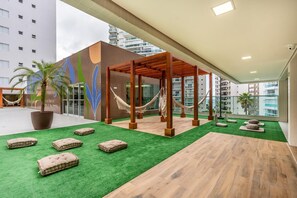 Terrace/patio - Asturias Guarujá - Brand new apartment, super comfortable and very well located. (Guarujá)