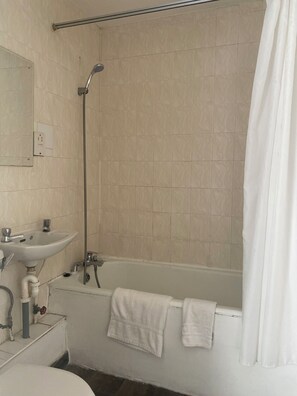 Shower, towels, soap, shampoo