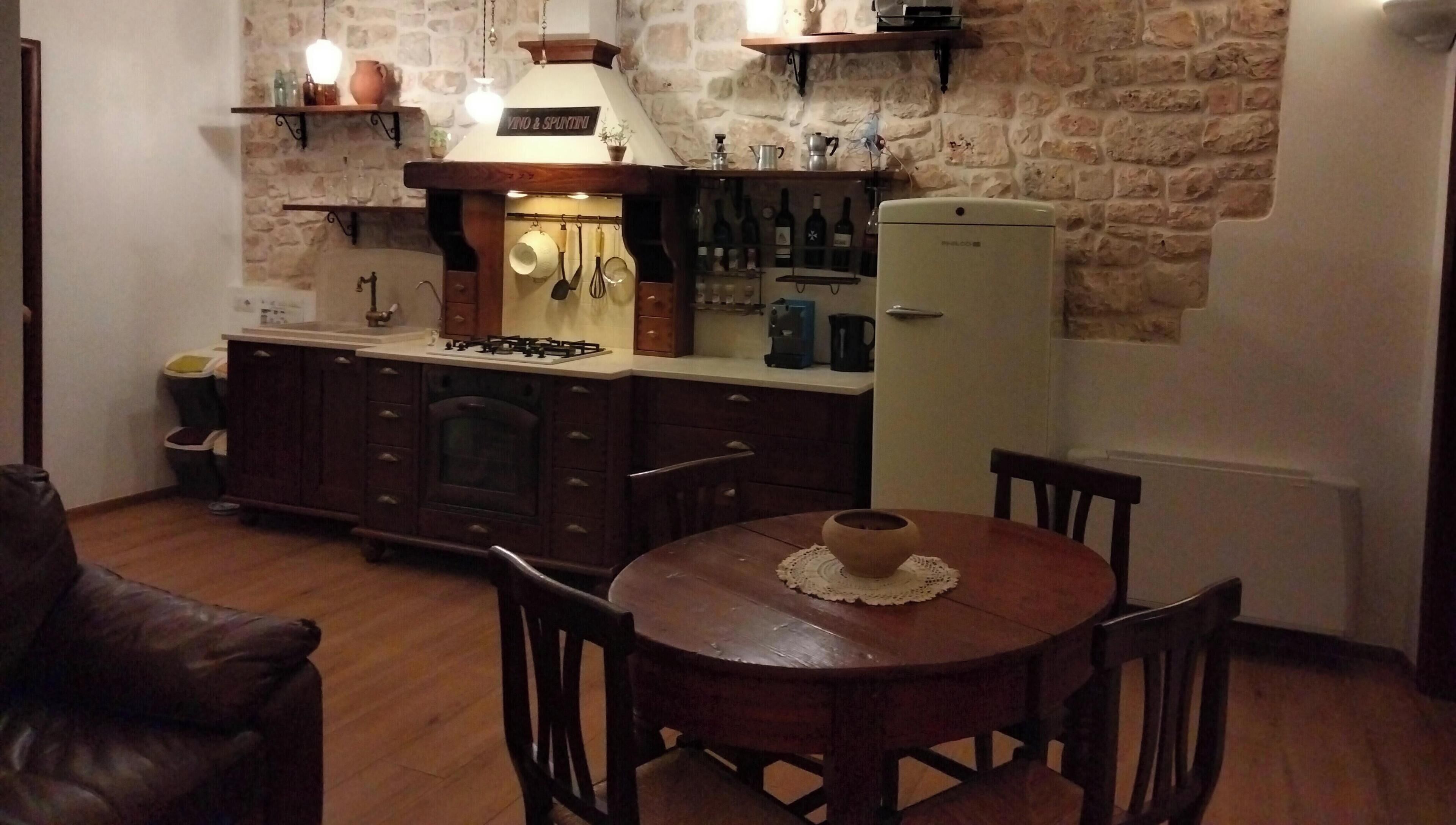 Suite exclusiva, terraza, vistas a la ciudad | Cocina privada