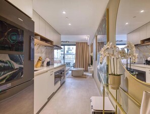 Fridge, microwave, oven, stovetop - Official Mercury Suites: 2BR designer w/WIFI & AC (St. Julian`s)