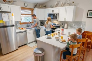 Fridge, microwave, oven, stovetop - Mins from Beach • Outdoor Patio & Games • Sleeps 9 (Kitty Hawk)