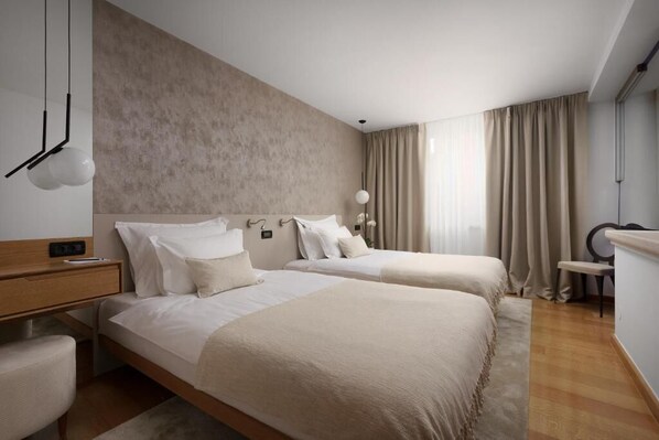 Zimmersafe, schallisolierte Zimmer, Bügeleisen/Bügelbrett