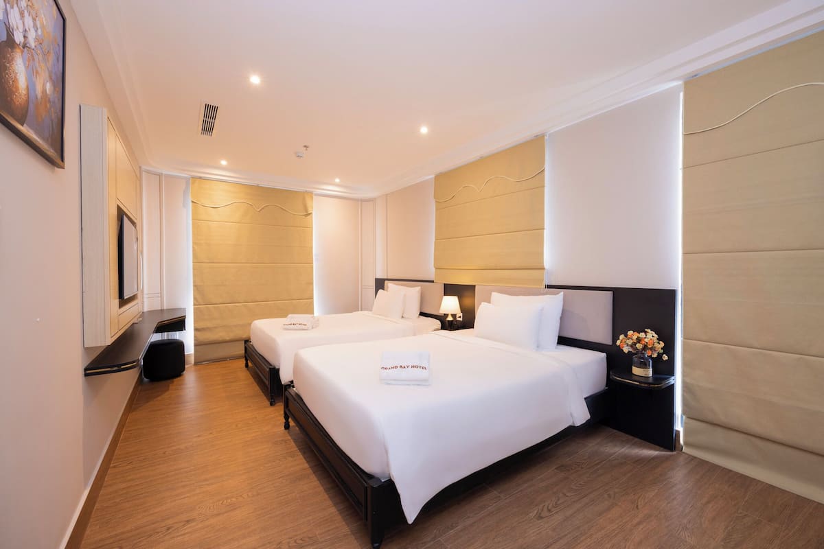 Chambre Deluxe avec lits jumeaux | Coffre-fort, rideaux dâobscurcissement, accĂšs au Wi-Fi (inclus)