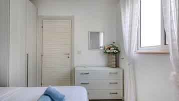 2 quartos, ferros/tábuas de passar roupa, Wi-Fi de cortesia