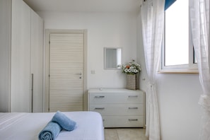 2 quartos, ferros/tábuas de passar roupa, Wi-Fi de cortesia