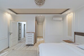 Exclusive Villa, Private Pool, Garden View | Desk, laptop workspace, blackout drapes, iron/ironing board - Alsawah 4 En-Suite Villa Private Pool (Sheikh Zayed City)