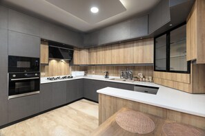 Exclusive Villa, Private Pool, Garden View | Private kitchen | Full-size fridge, microwave, oven, stovetop - Alsawah 4 En-Suite Villa Private Pool (Sheikh Zayed City)