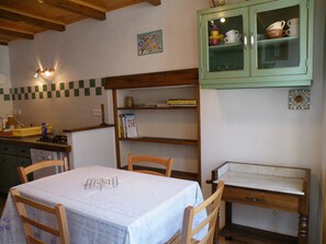 Dining - 3-person gîte in the heart of a small Bugist village. 300 € per week (MAGNIEU)