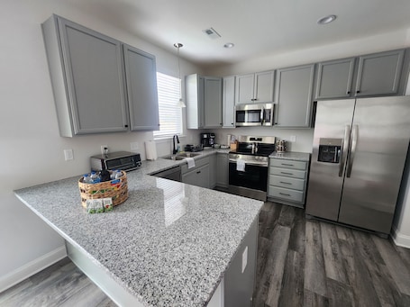 Private kitchen. Welcome to Luxury at Snowmill. Charming 4-bedroom house in Woodruff. SC.