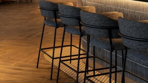A modern bar area with high stools, a wooden floor, and a large window providing natural light. - Radisson Hotel And Convention Center Steve Tshwete Middelburg (Middelburg)