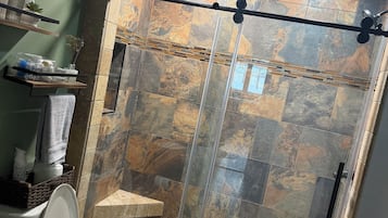 Shower, hair dryer, towels, soap