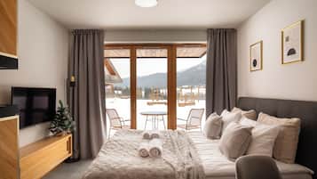 Deluxe-Studiosuite, Bergblick | Wohnbereich