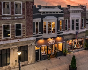 A historic building with a storefront labeled "POLTER Real Estate Solution." - The Alibi- (We will cover for you) (Port Clinton)