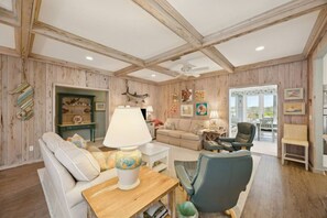 TV, fireplace, books - Quiet Tide Oceanfront Family Retreat (Jacksonville Beach)