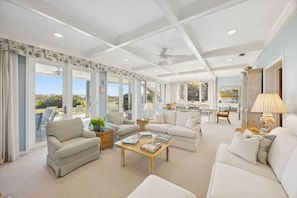 TV, fireplace, books - Quiet Tide Oceanfront Family Retreat (Jacksonville Beach)