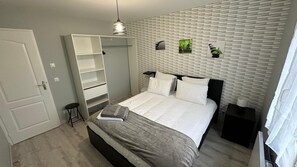 4 dormitorios, tabla de planchar con plancha, wifi y ropa de cama