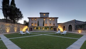 A large, two-story building with a stone facade and a well-maintained lawn. - VILLA ARTIUM - Twenty Bedroom Villa, Sleeps 37 (Firenze)