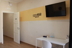 Deluxe Quadruple Room, Housekeeping, City View | Interior