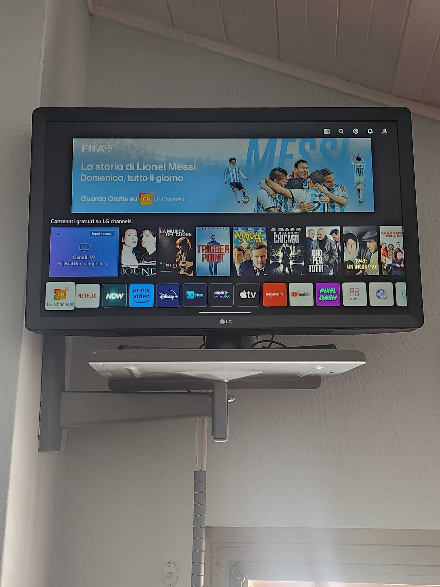 A television displaying a sports channel interface with various streaming options.