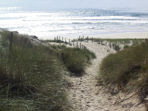 Charming, typical wooden cabana Beautiful landscaped terrace 2 steps from the beach