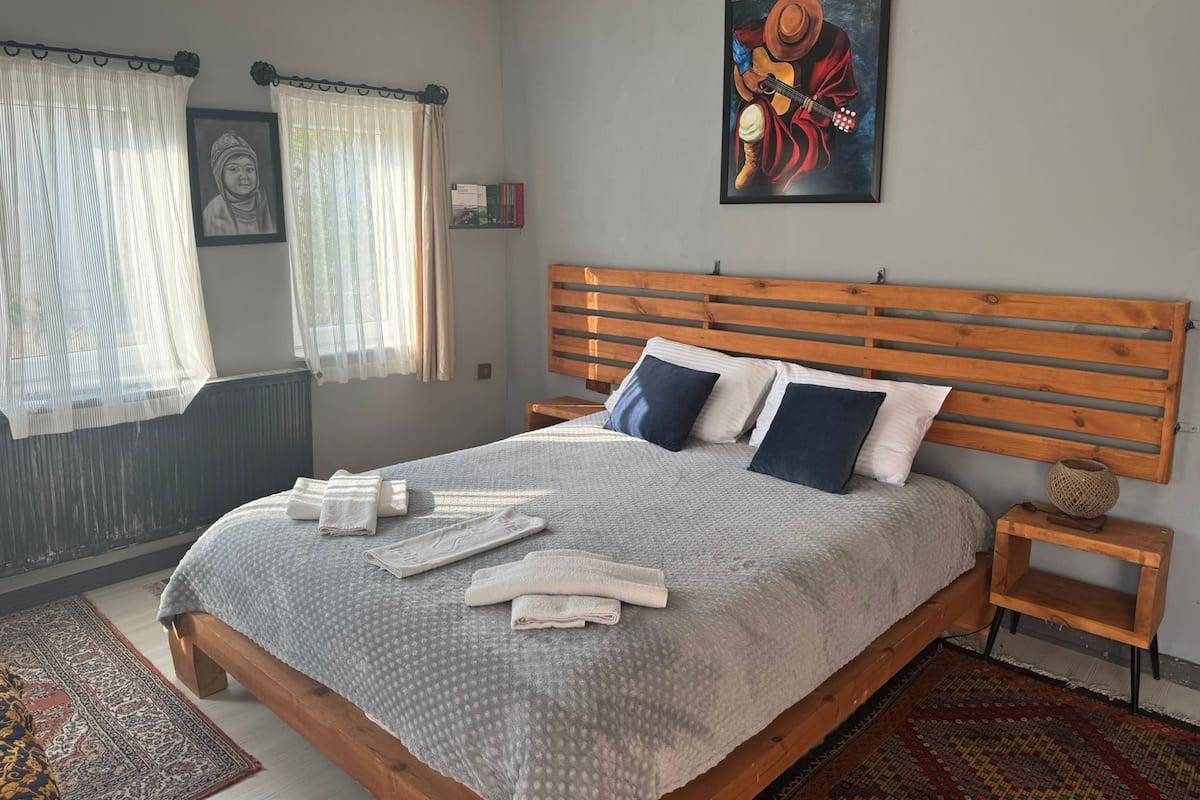 Family Suite, Garden View | Desk, laptop workspace, iron/ironing board, free WiFi