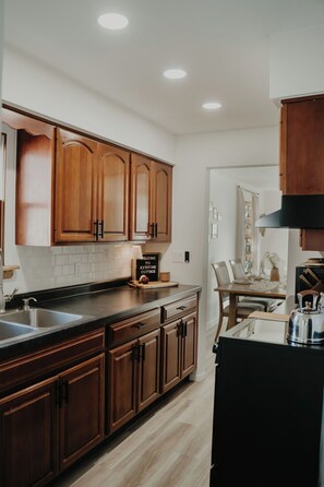 Fridge, microwave, oven, stovetop - Entire Home w/ Lake View & Hot Tub, Kid & Dog Fence Yard, Book Nook, VHS TV (Akron)