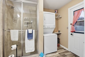 Shower, hair dryer, towels, soap