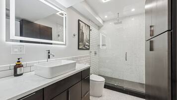 Shower, hair dryer, towels, soap