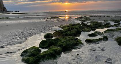 Charming house set in a landscaped garden close to the sea.