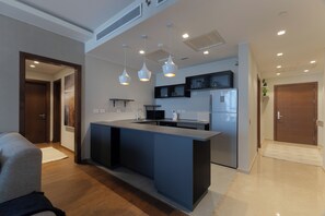 Lägenhet Comfort - 2 sovrum - utsikt mot staden - executive-våning | Eget kök | Stort kylskåp, mikrovågsugn, ugn och spishäll