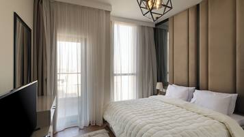 Comfort Apartment, 2 Bedrooms, City View, Executive Level | Desk, laptop workspace, iron/ironing board, free WiFi