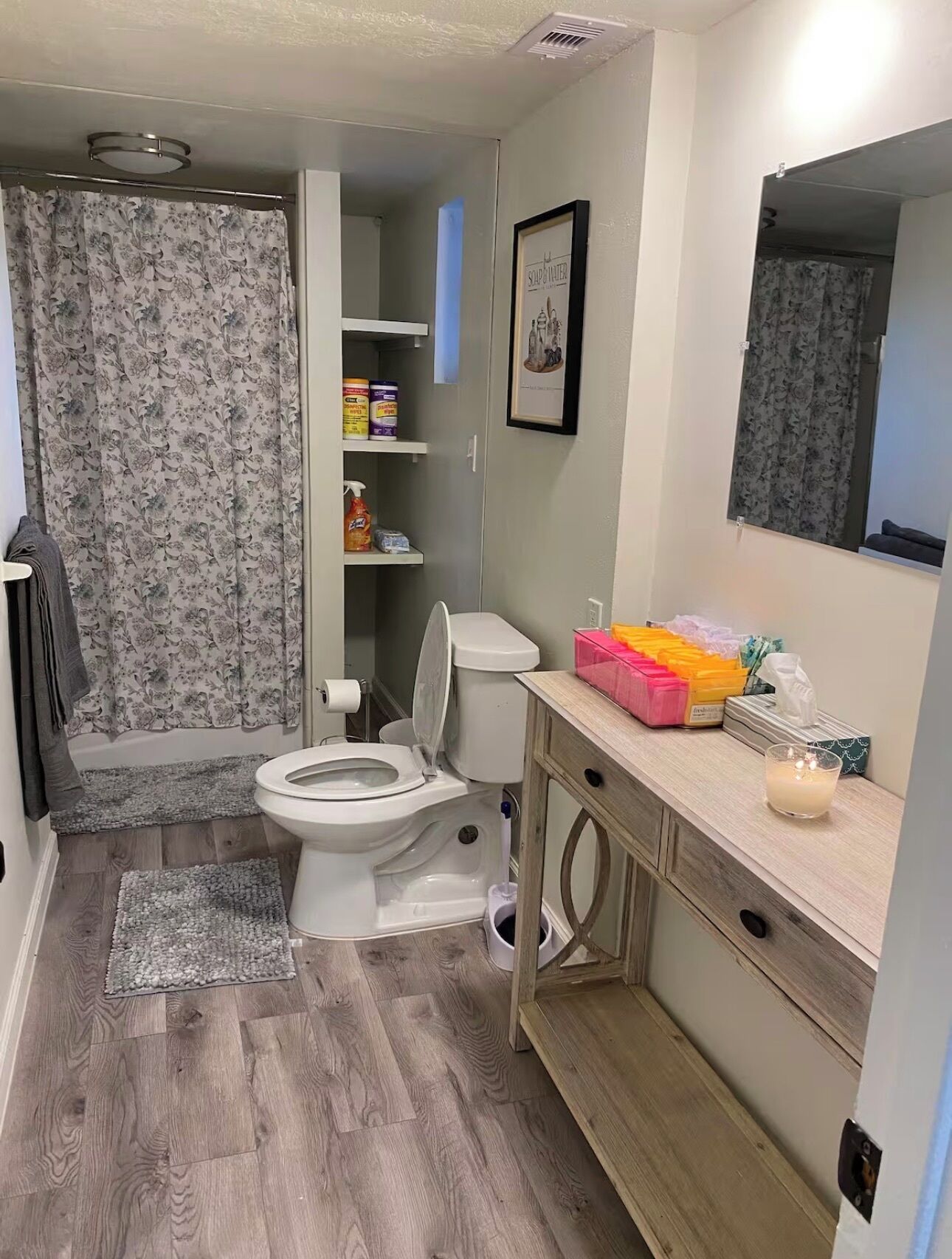 Shower, towels, soap, toilet paper