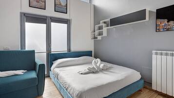 1 chambre, fer et planche Ă repasser, Wi-Fi, draps fournis