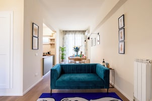Apartment, Balcony, City View | Living area | TV