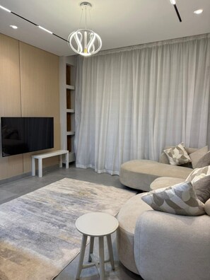 55-inch Smart TV with digital channels - Alsawah Nordic Suite In Village West (Sheikh Zayed City)