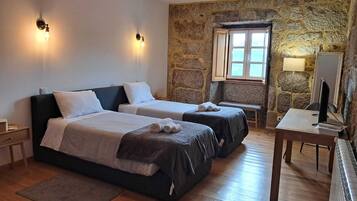 Premium bedding, down duvets, memory-foam beds, desk