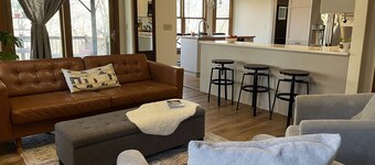 4-bedroom, sleeps 12 with walking trail and easy highway access.