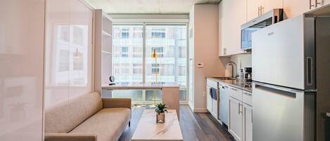 公寓 | 起居区 | 65-英寸智能电视(配备有线频道)