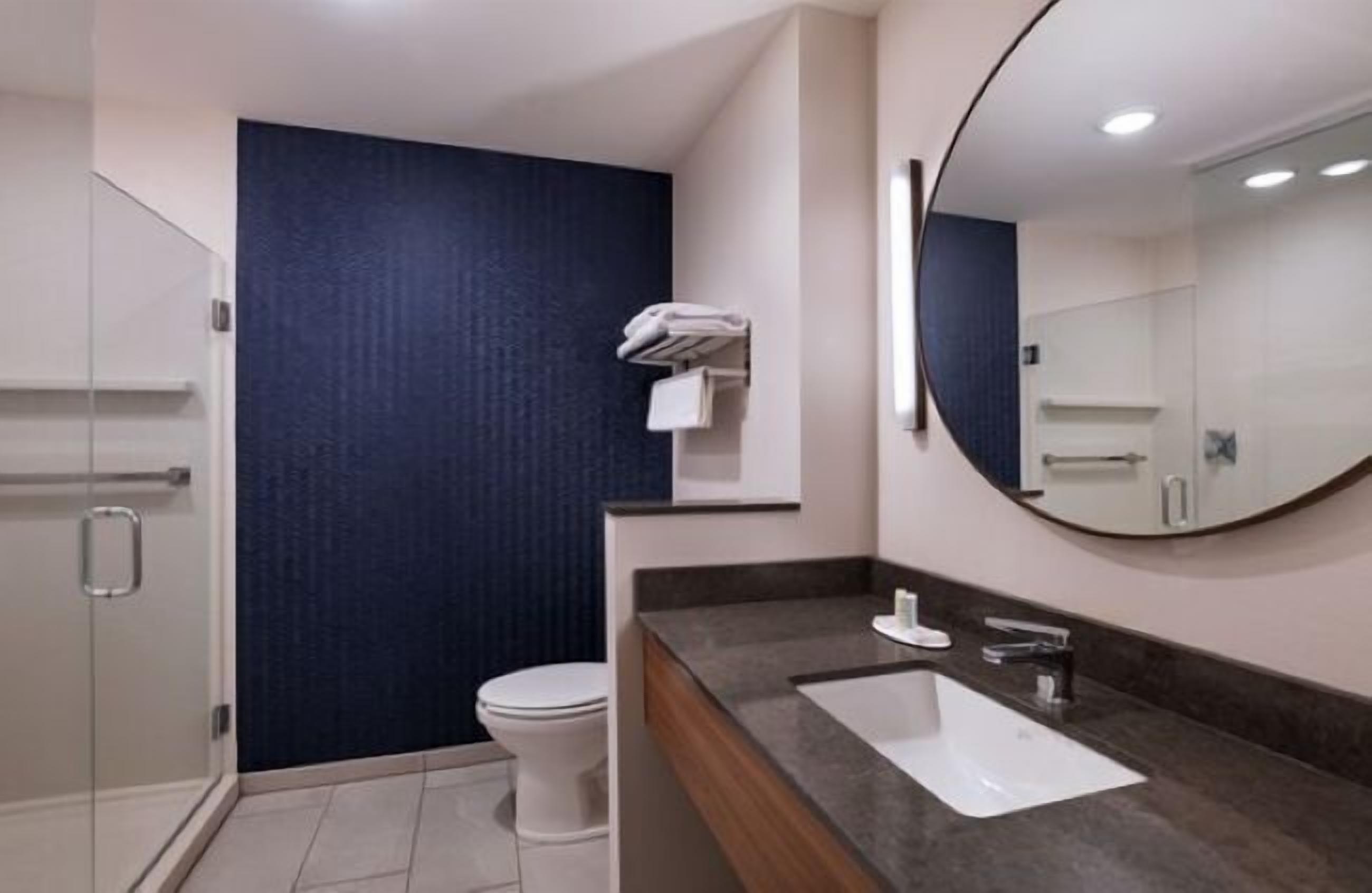 Hair dryer, towels, soap, shampoo