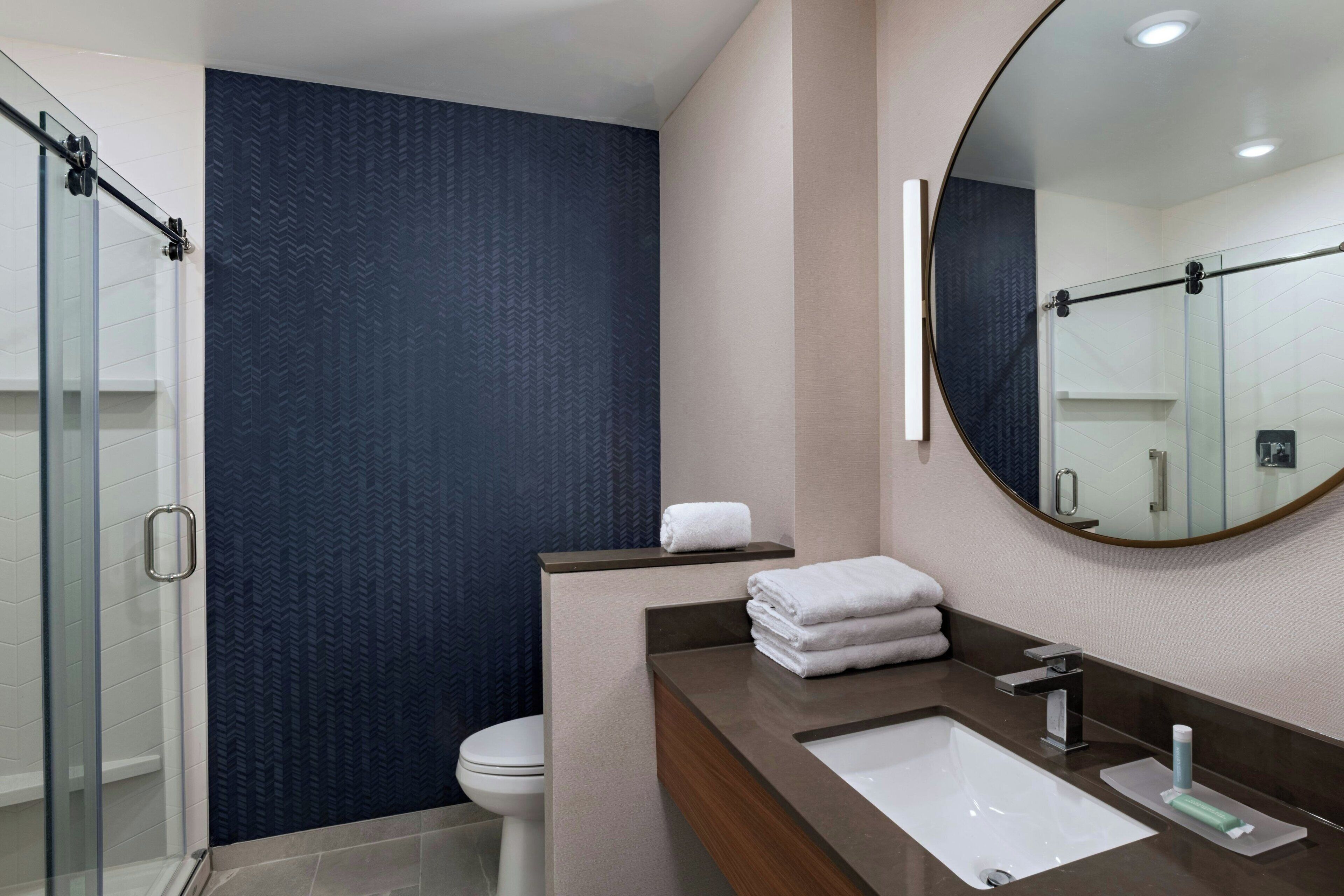 Hair dryer, towels, soap, shampoo