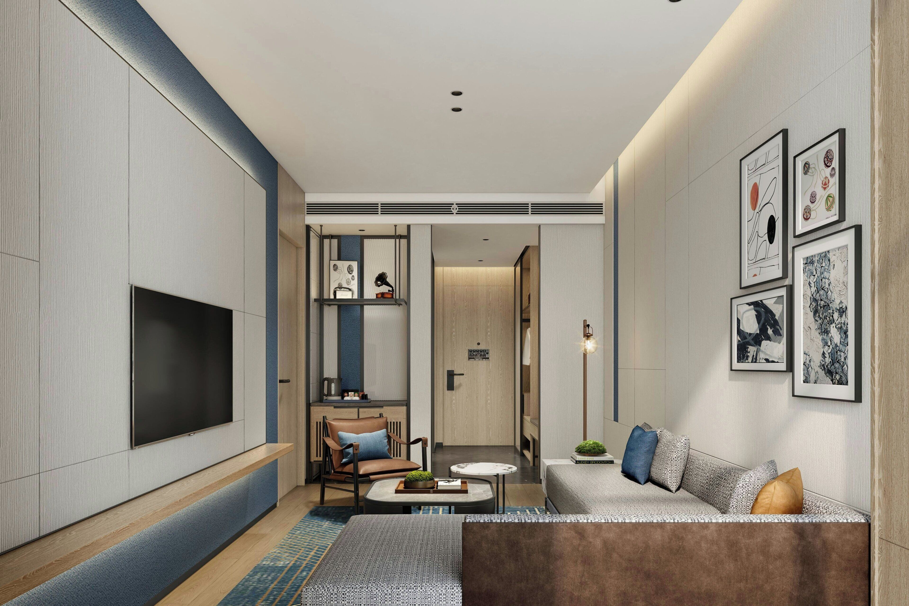 프리미엄 스위트, 침실 1개, 시내 전망 | 거실 | 케이블 채널 시청이 가능한 55인치 LCD TV