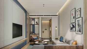 Premium Suite, 1 Bedroom, City View | Living room | 55-inch LCD TV with cable channels