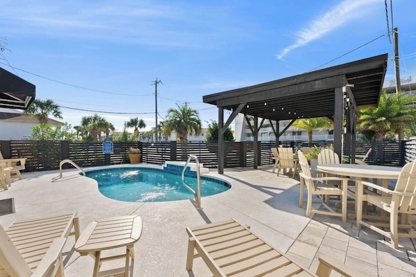 Private heated pool with outdoor seating