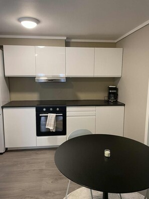 Appartement, balcon, vue sur la ville | Cuisine privée