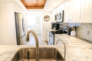 Fridge, microwave, oven, stovetop - Barefoot Trace 109-Direct Oceanfront Premium Two Bedroom Condo (St. Augustine)