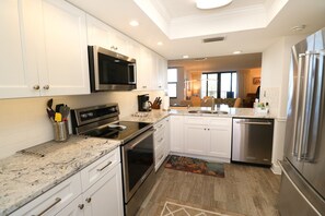 Fridge, microwave, oven, stovetop - Premium, Remodeled Direct Oceanfront Two Bedroom Condo--Barefoot Trace 207 (St. Augustine)