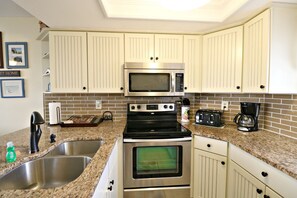 Fridge, microwave, oven, stovetop - Ocean Village Club Condo D21 (St. Augustine)