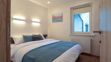 Apartamento, Se admiten mascotas, vistas a la ciudad | Caja fuerte, cortinas opacas, tabla de planchar con plancha